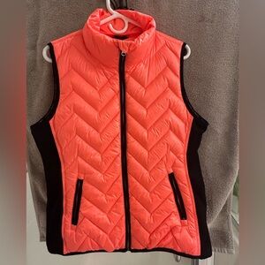 Calvin Klein Performance Vibrant Coral and black puffer Vest. Size. Lg like new